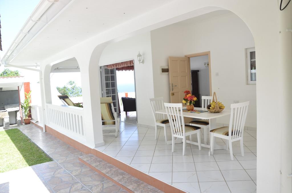 Ixora Villa Anse Royale Cameră foto