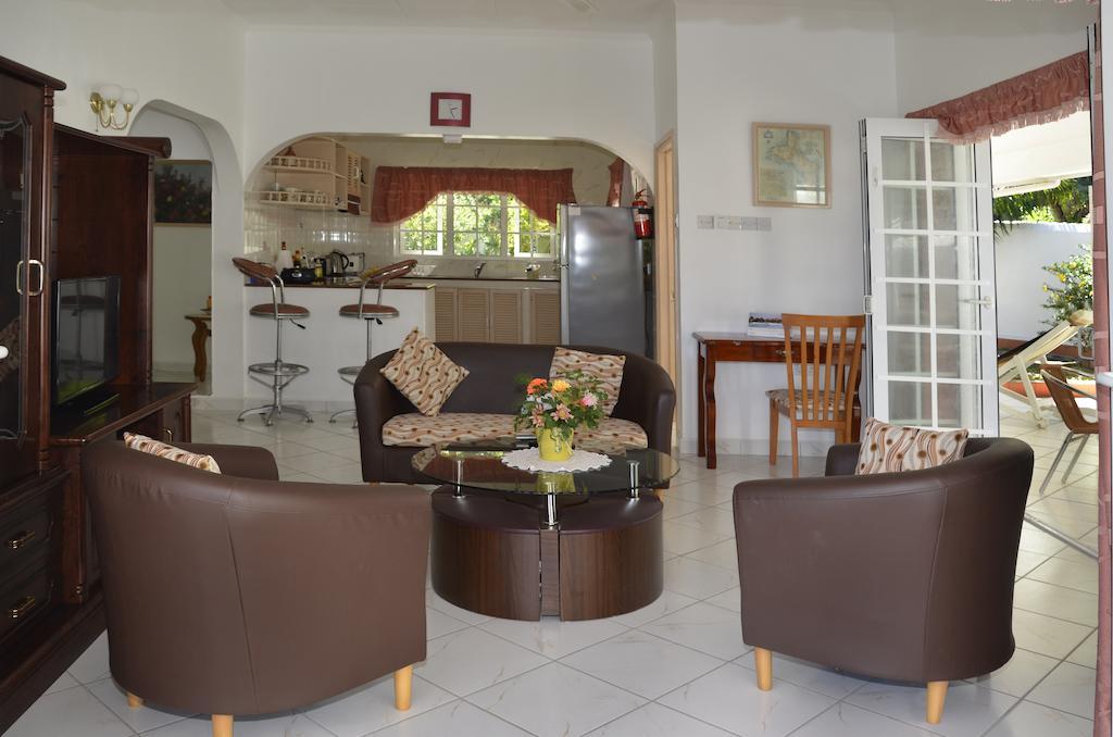 Ixora Villa Anse Royale Cameră foto