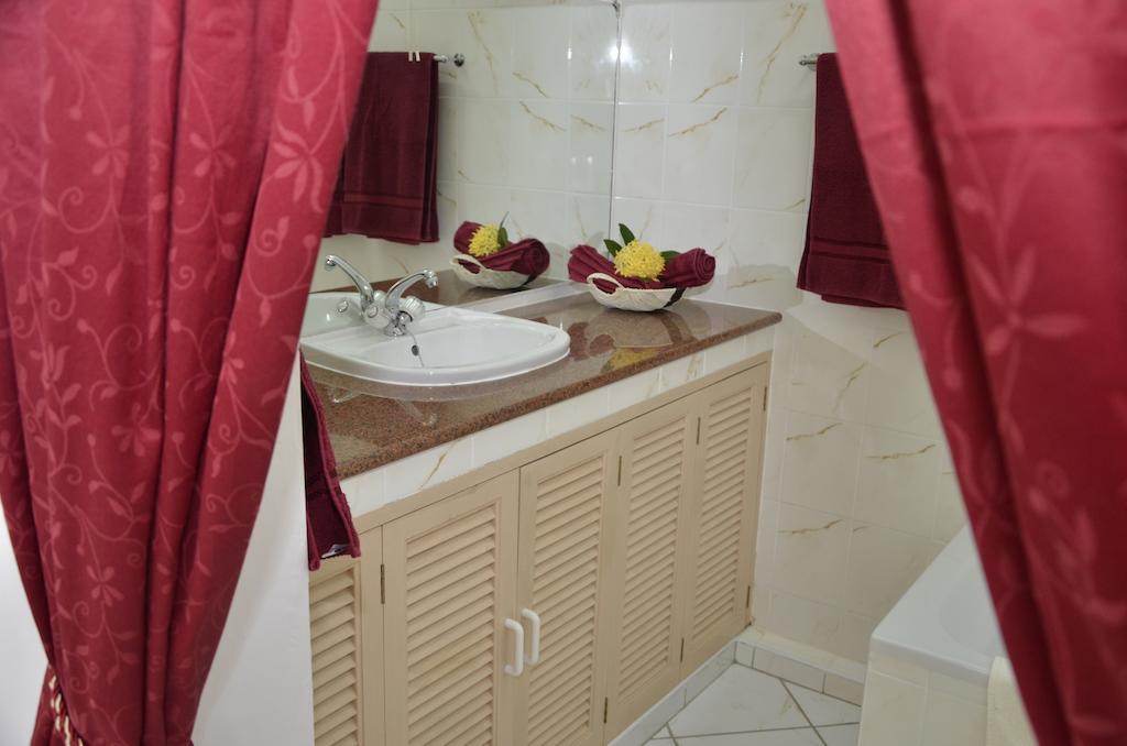 Ixora Villa Anse Royale Cameră foto