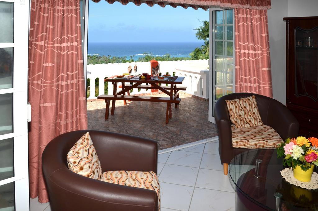 Ixora Villa Anse Royale Cameră foto