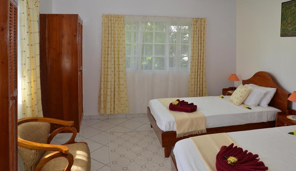 Ixora Villa Anse Royale Cameră foto