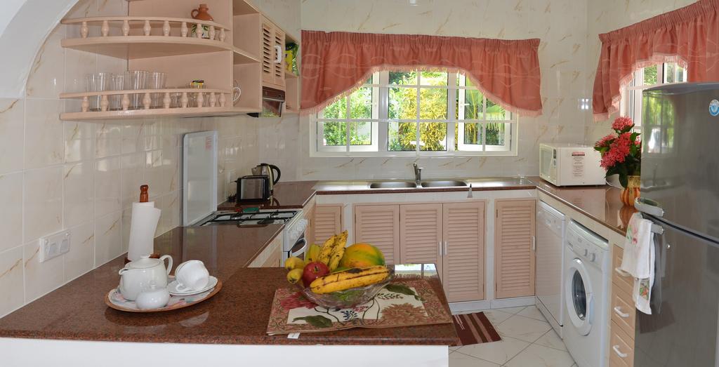 Ixora Villa Anse Royale Cameră foto