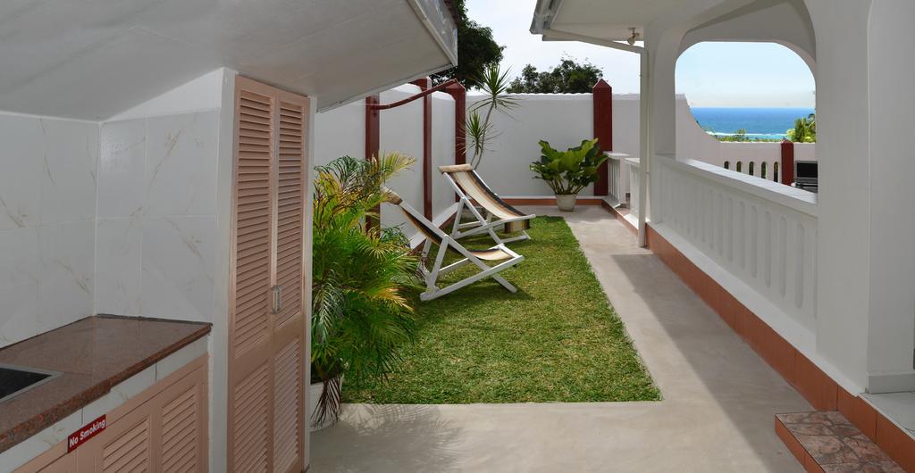 Ixora Villa Anse Royale Cameră foto